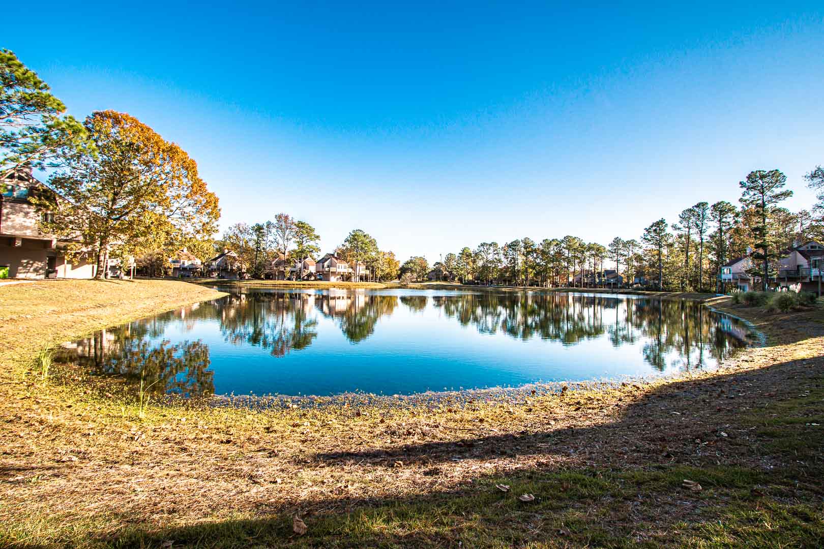 A peaceful view of the lake at VRI's Waterwood Townhomes in New Bern, North Carolina.